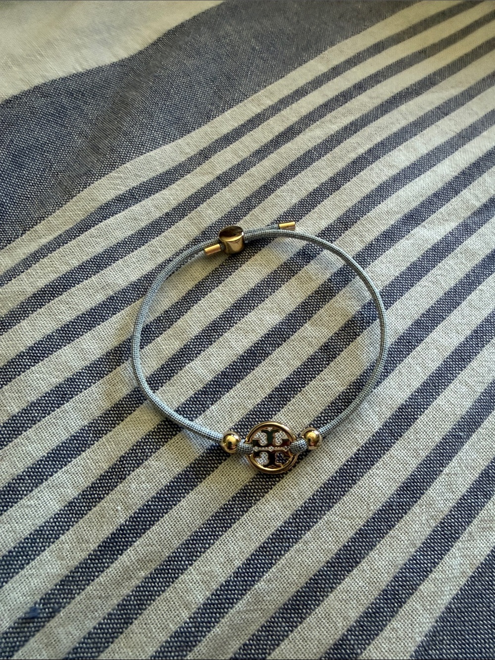 Tory Burch Gold Accent Light Blue Cord Bracelet